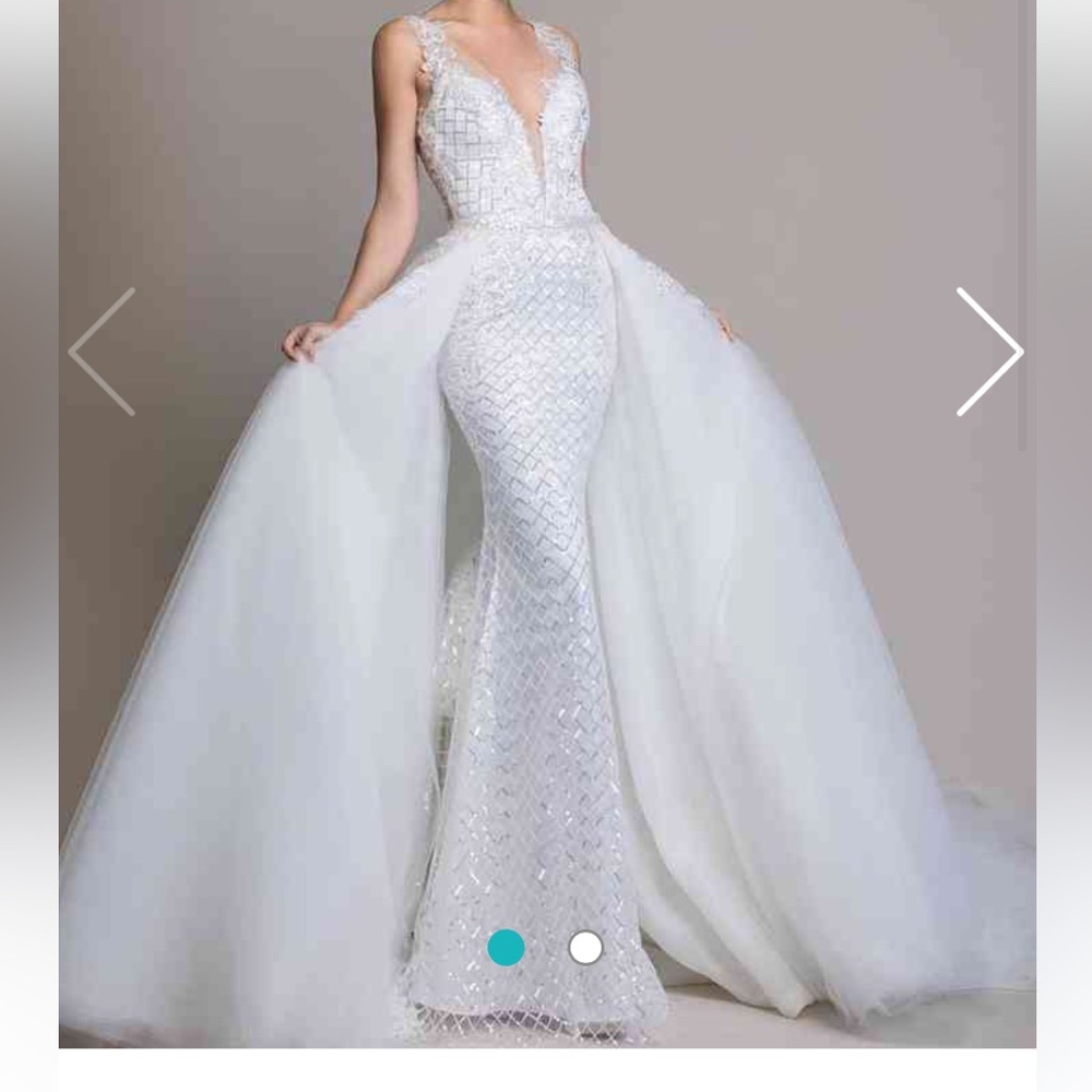 Love by Pnina Tornai for Kleinfeld's wedding gown with detachable skirt.